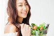 © Shutter B - Healthy lifestyle, Close up beautiful young asian woman eating salad smiling happy. Healthy eating, Food and lifestyle, Health, Beauty, Dieting concept.