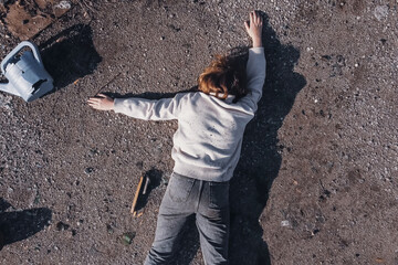 dead body the corpse of a teenage girl found using a drone in a landfill aerial survey to search for the missing