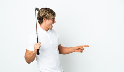 English man playing golf pointing finger to the side and presenting a product