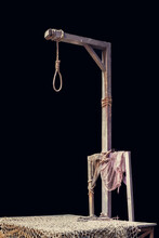 Wooden Gallows And Loop Rope With Dark Background