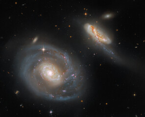 Wall Mural - nasa/esa/hubble arp 296 with the two galaxies ngc 7469, ic 5283.
