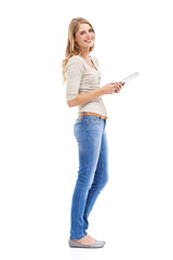 Casual confidence. Shot of an attractive young blonde woman isolated on white.