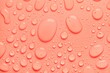Cosmetic moisturizing liquid drops on gray background. Toner or lotion. Hyaluronic vitamine serum
