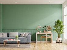 Interior Mockup Green Wall With Blue Sofa And Work Table Set In Living Room.