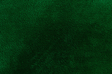 Background and textured of Fluffy hair like a blur of the green velvet floor.