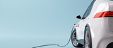 Fototapeta  - E-mobility, electric car charging battery on blue background. 3d rendering