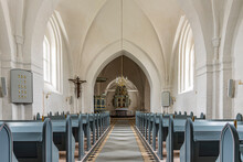 The Interior Of A White And Grey Scandinavian Church