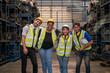 © Thirawatana - Group Engineers or technicians are inspecting auto parts in warehouses and factories. Team of workers and engineer celebrating in parts warehouse