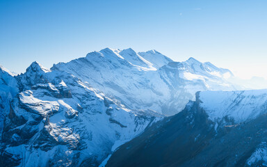 Wall Mural - mountain scenery in the swiss alps. mountains peaks. natural landscape. mountain range and clear blu