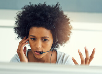 Poster - Okay...explain it to me. Cropped shot of an attractive young businesswoman working in a call center.