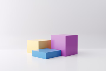 Wall Mural - Pastel colored pedestals or platforms in cube shape with white studio background for product display.