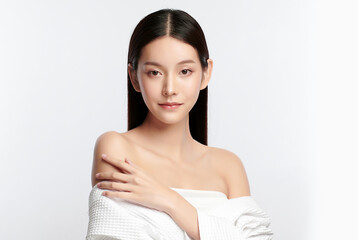 beautiful young asian woman with clean fresh skin on white background, face care, facial treatment, 