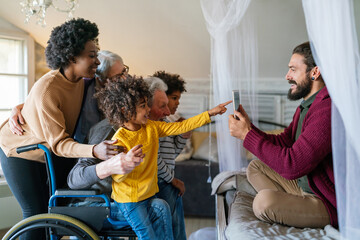 Wall Mural - Portrait of multiethnic happy multi-generation family spending time together