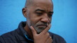 A worried pensive senior black man preoccupied