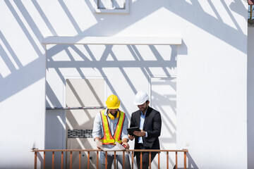 Poster - Engineers are discussing data working and tablet or laptop with architectural project at new construction site,Engineering tools and construction concept.