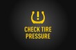 Check Tire Pressure warning on a black background