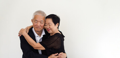 Wall Mural - Asian senior elderly couple happy business owner hugging each other smiling