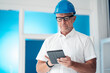 © Westend61 - Construction worker using tablet computer