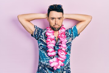 Canvas Print - Young hispanic man wearing summer style depressed and worry for distress, crying angry and afraid. sad expression.