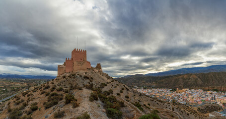 Wall Mural - view of the Moorish castle and village of Tabernas in the desert of Andalusia