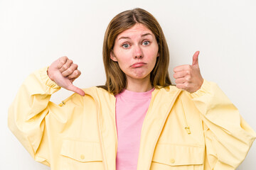 Young English woman isolated on white background showing thumbs up and thumbs down, difficult choose concept