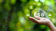 ESG icon concept in hand for environmental, social and governance in sustainable, renewable resources and networking icons on green background.