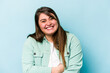© Asier - Young caucasian overweight woman isolated on blue background laughing and having fun.