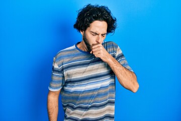 Poster - Handsome hispanic man wearing casual clothes over pink background feeling unwell and coughing as symptom for cold or bronchitis. health care concept.