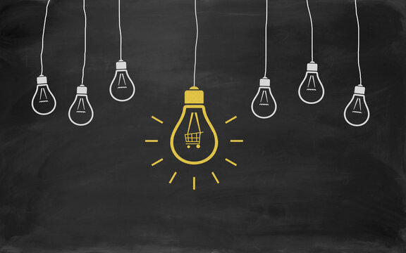 Shopping Cart Symbol Bulb Concept Drawing with Chalk on Blackboard