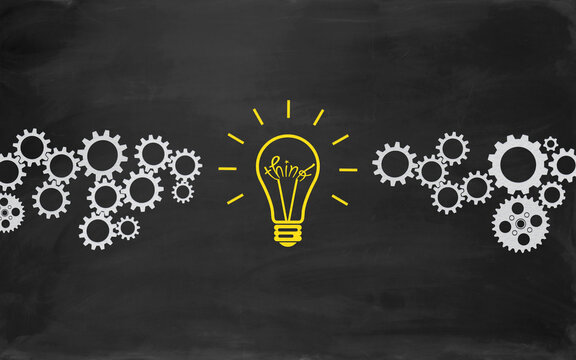 Think Bulb Concept Drawing with Chalk on Blackboard