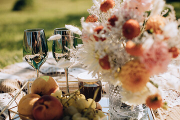 Wedding Dinner served for two outdoor on green grass