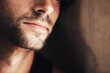 © Nicola Katie/peopleimages.com - Hes got a chiselled jaw. Cropped image of the lower half of a handsome mans face.