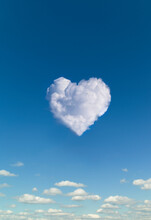 Heart Shaped Clouds Against Blue Sky
