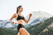© Tetra Images - United States, Utah, American Fork, Athlete woman jogging in mountain landscape