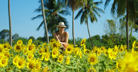 Asian Woman 40s LGBT transgender express feeling Happy Smile fun under sunshine in Sunflower yellow