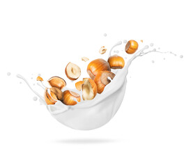 Wall Mural - Crushed hazelnuts in milk splash close-up on white background