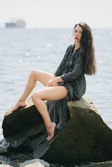 Wall Mural - Beautiful adult woman enjoy sea on sunny day.