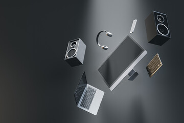 Aufkleber - Abstract flying tech pieces on gray background with mock up place. Laptop computer, speakers and headphones. Music and technology concept. 3D Rendering.