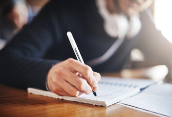 Poster - Take notes now and study hard later. Cropped shot of an unrecognizable male university student in class.