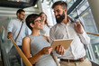 © NDABCREATIVITY - Collaboration and analysis by business people working together in office