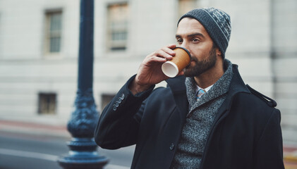Poster - They have the best coffee here in the city. Cropped shot of a fashionable young man in an urban setting.