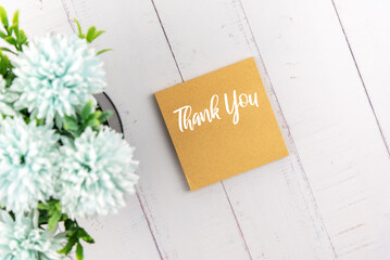 Wall Mural - Thank you note on adhesive note with flower flat lay