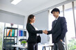 © todja - Teamwork Deal Cooperation Partnership business people shaking hands, Shaking hands of two business people in the office