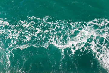 Poster - Waves bubbles ocean water background.