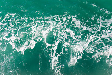 Poster - Waves bubbles ocean water background.