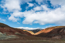 Panoramic View Of Red Striped Mountains In Winter