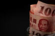 100 New Taiwan Dollar bills in glass jar, business concept.