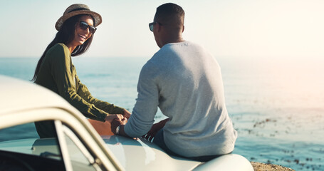 Aufkleber - Hes all she needs to be happy. Cropped shot of a young couple making a stop at the beach while out on a road trip.