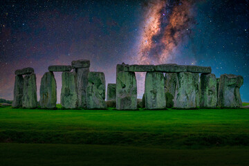 Fototapete - Landscape image of Milky way galaxy at night sky with stars over Stonehenge an ancient prehistoric stone monument, Wiltshire, UK.