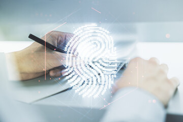 Aufkleber - Double exposure of abstract creative fingerprint hologram with hand writing in notebook on background with laptop, research and development concept